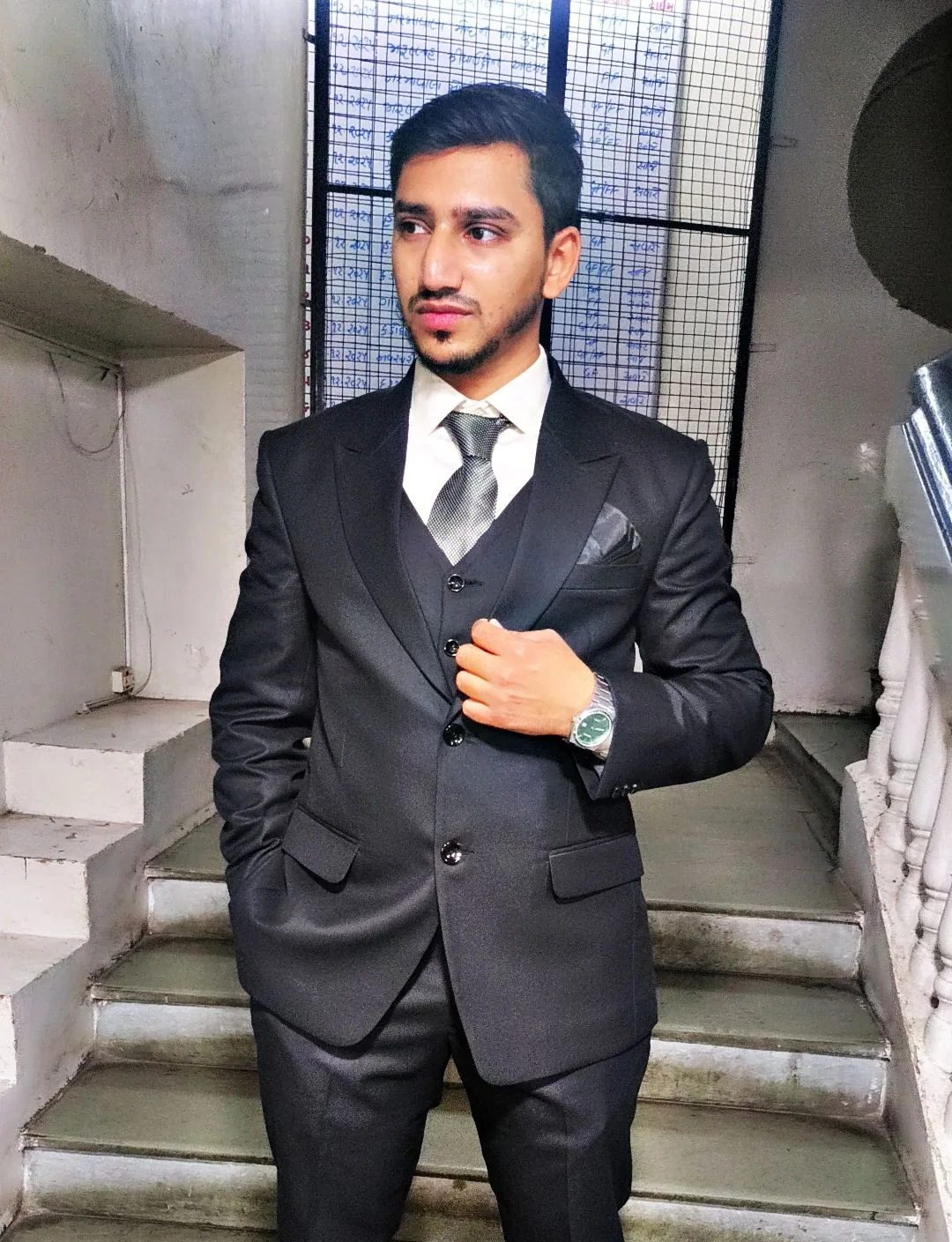 Dr. Arbaz Shaikh in a formal suit